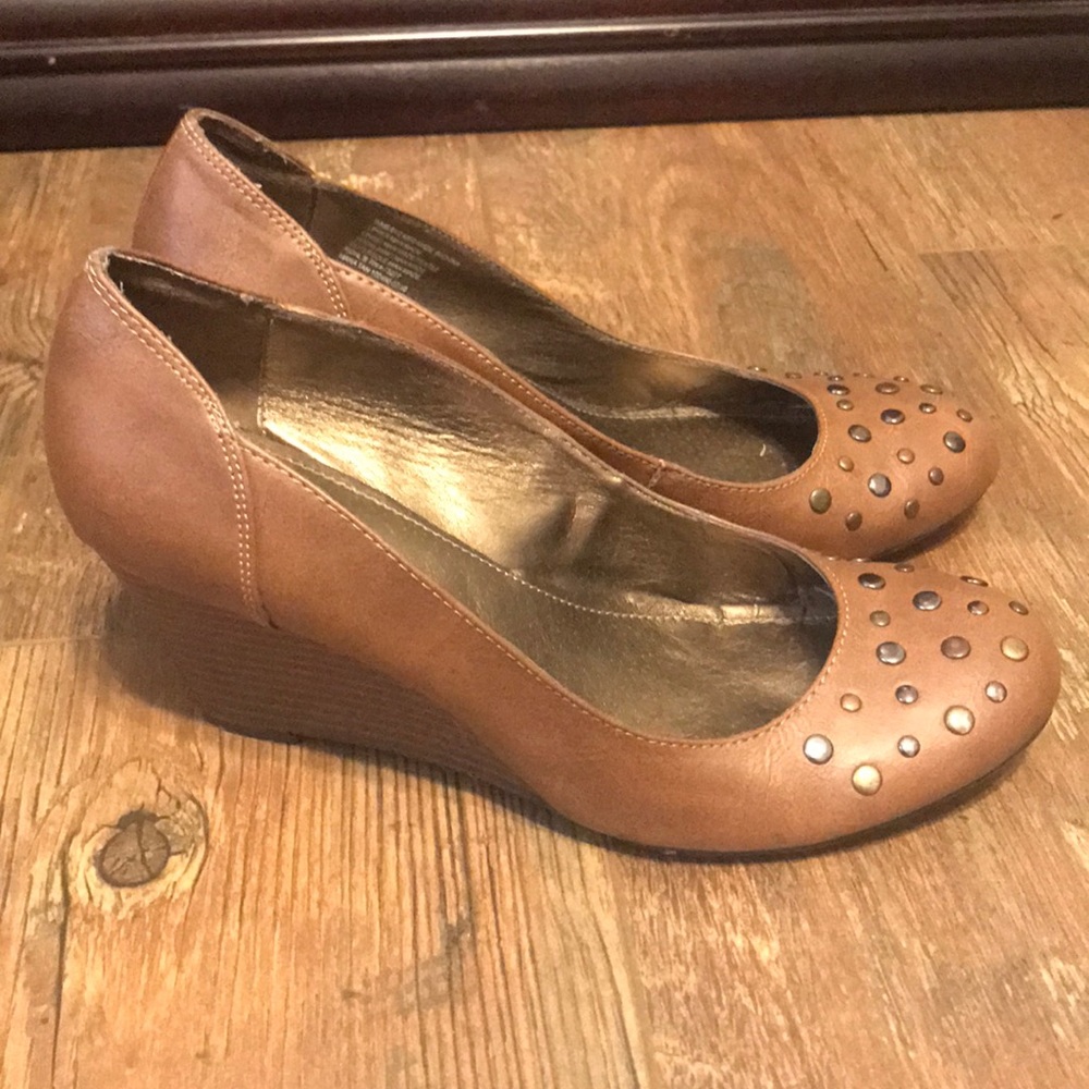 Brown wedge with stud accents on the toe area